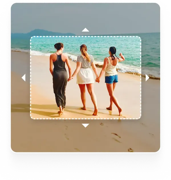 Three women walking on the beach An image of three women holding hands and walking on a beach. A dotted frame with arrows suggests the use of a tool for editing or extending the image