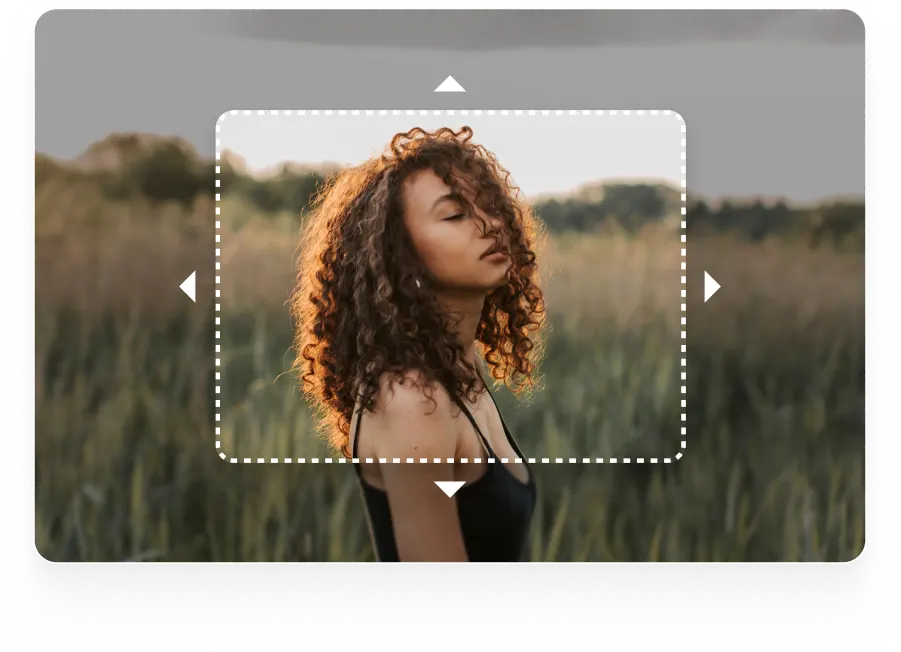 An image of a woman standing in a grassy field with a dotted frame around her, suggesting an image extension or cropping tool