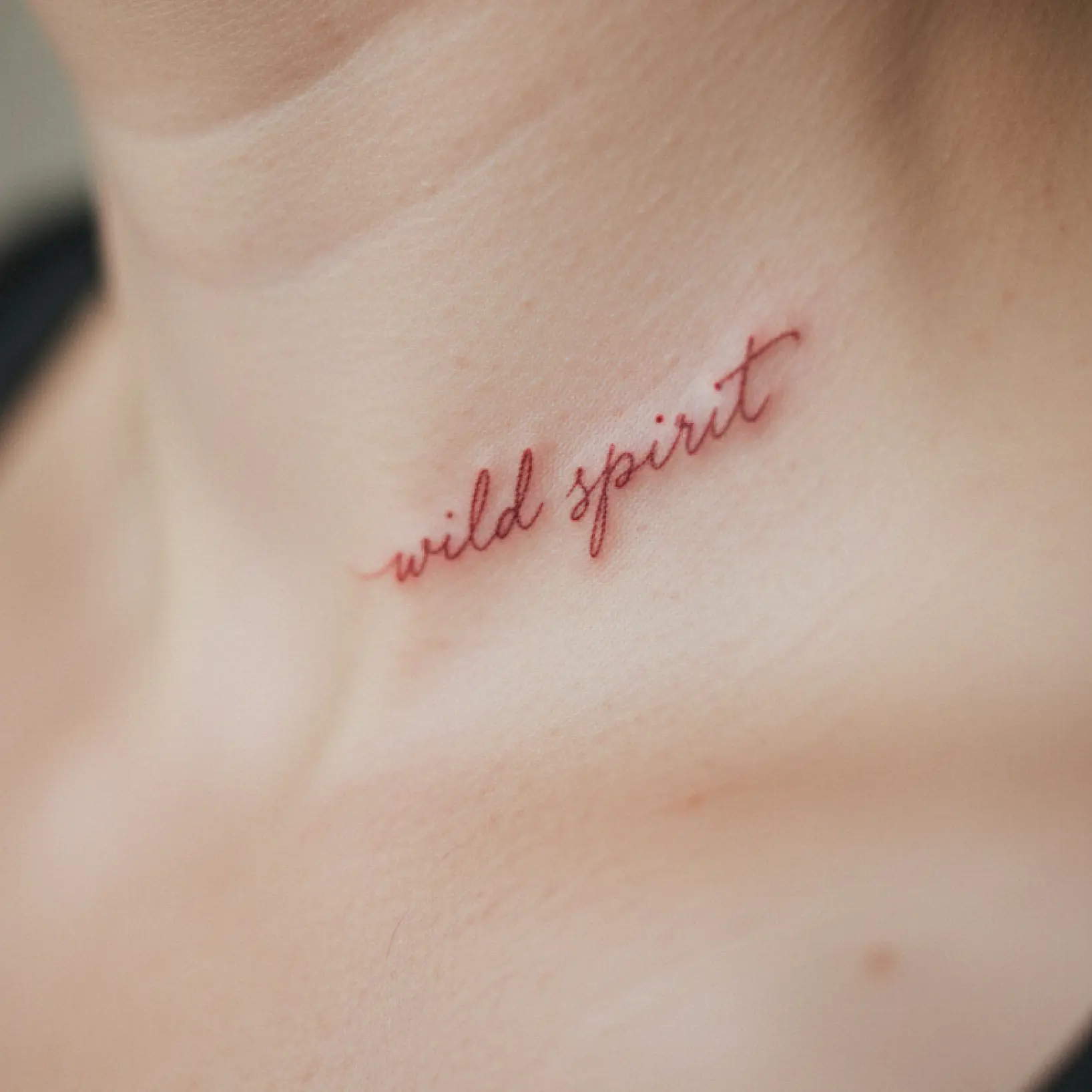 AI Tattoo text generator showing custom script design previewed on neck