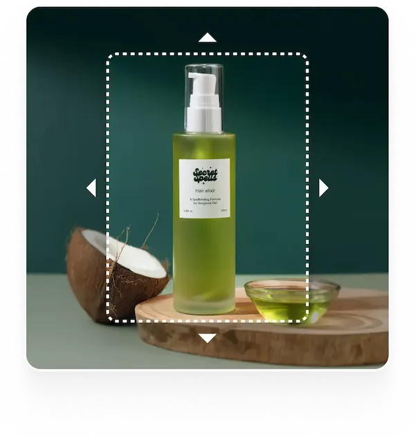 An image of a cosmetic bottle An image of a cosmetic bottle and a coconut, with a dotted frame suggesting a tool for extending or editing the image.